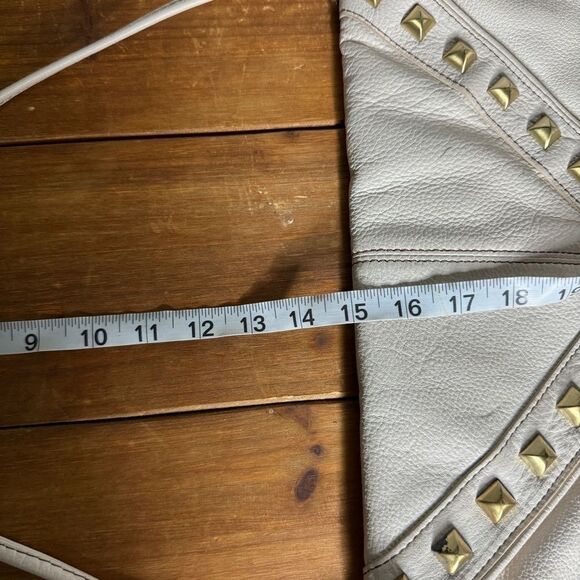 Vince Camuto ivory pebbled leather studded tassel shoulder bag - Picture 15 of 16